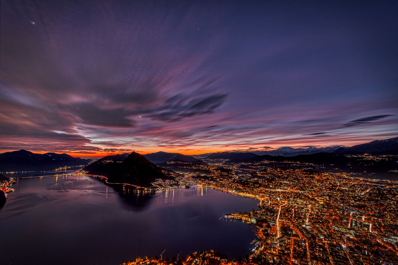 Switzerland at night — lake and city lights